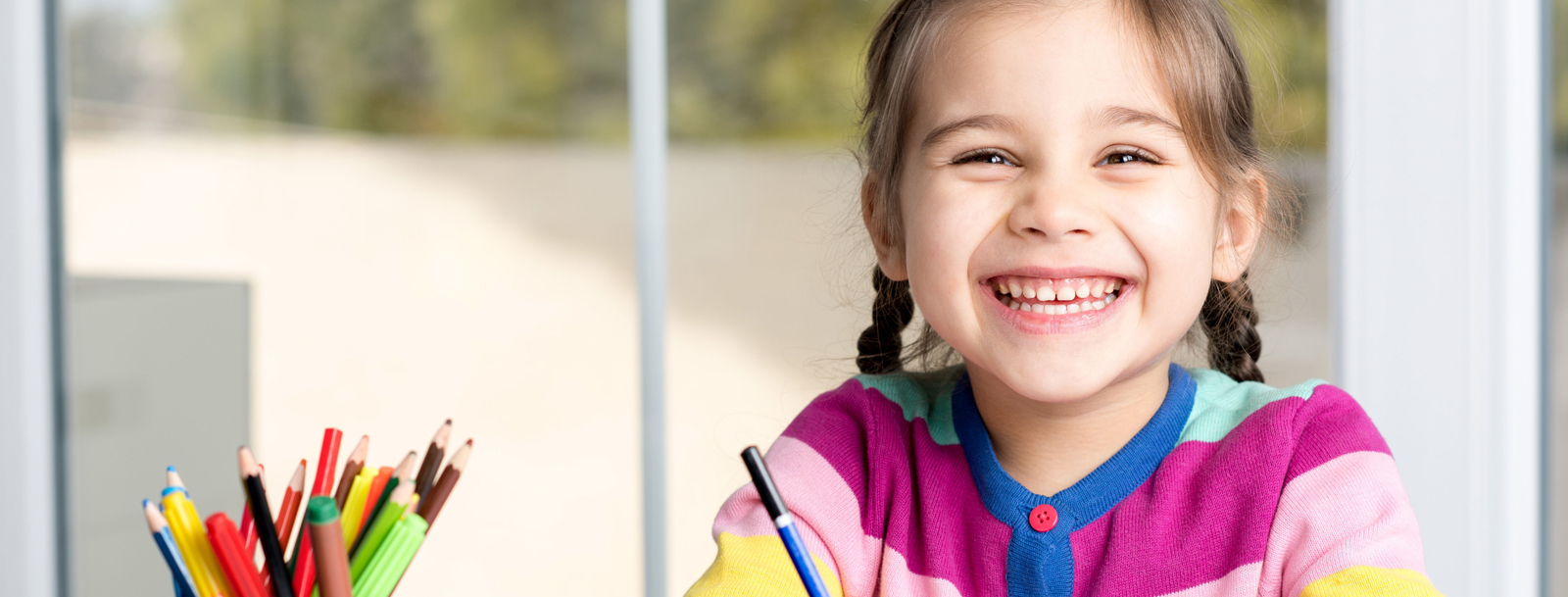 Child practicing letters and numbers