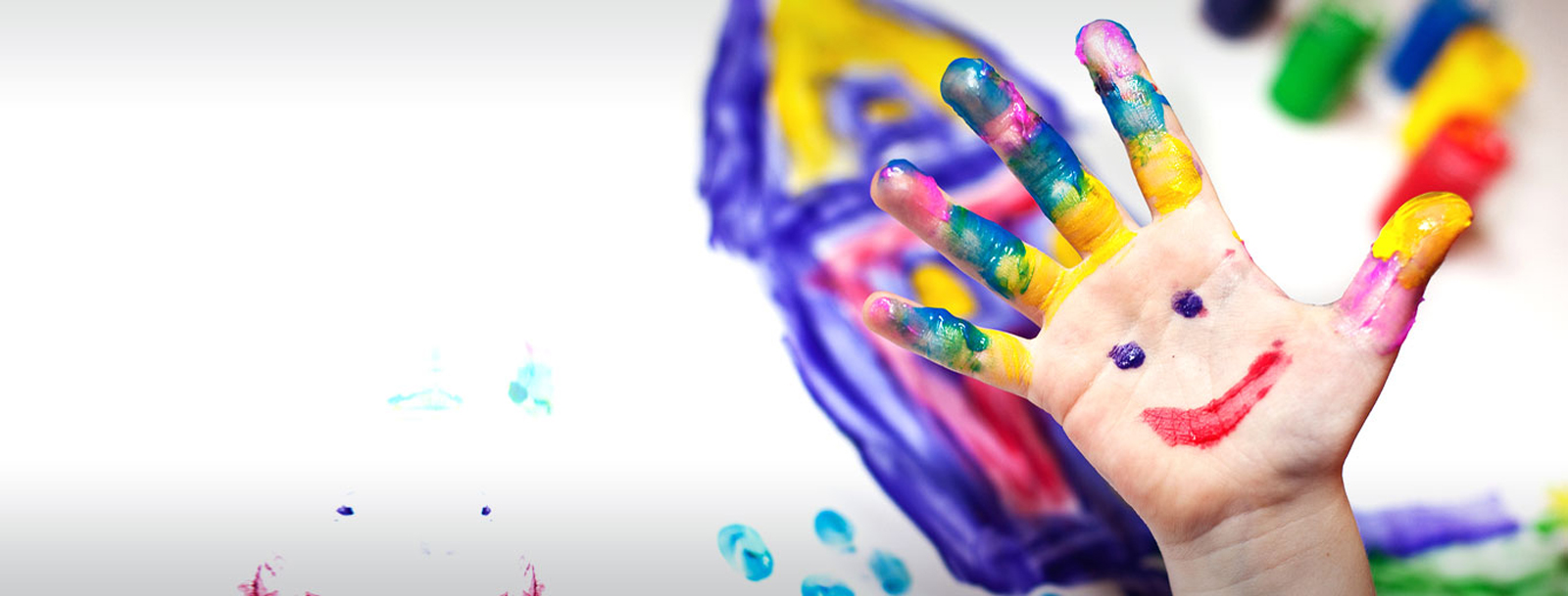 Child with painted hand artwork